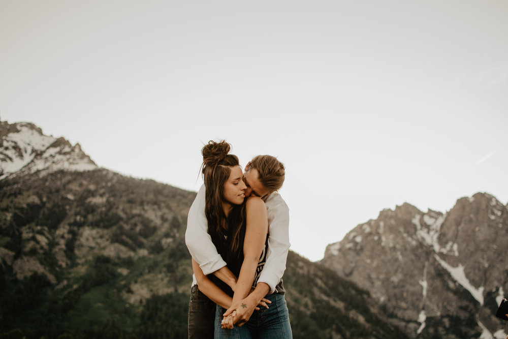 Couple with warm skin tones and white skys for this mountain engagement session.jpg