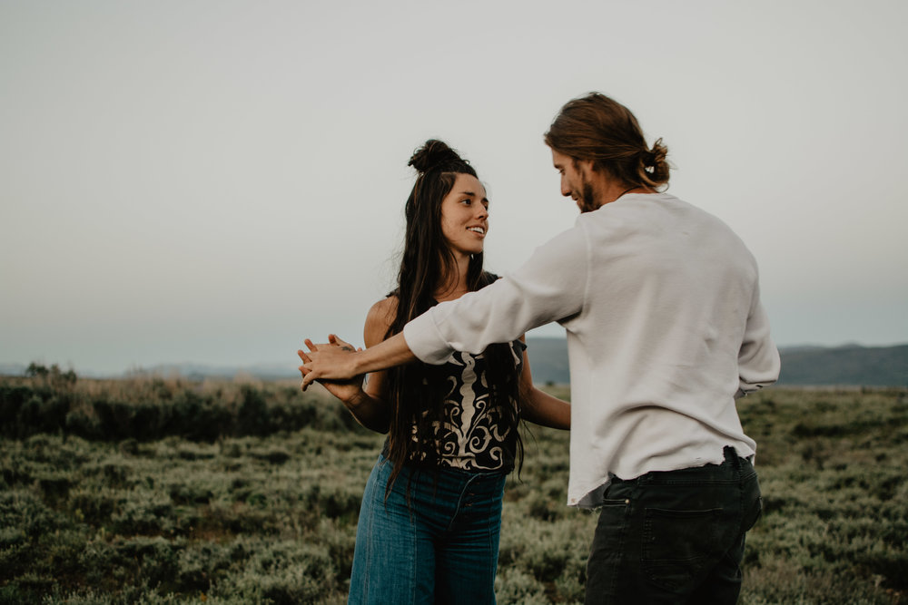 Jocilyn Bennett Photography | Engagement Pose Ideas | Destination Wedding Photographer | Elopement Wedding Photographer | National Park Elopement Photography | Capturing raw and genuine emotion | Wyoming photographer | Wyoming wedding photographer | National Park Weddings | Outfit ideas for engagements | Mountain engagements | Adventure Photographer | Movement photography | Bohemian photography | Bohemian wedding | Jackson Hole Photography | Grand Teton National Park | Pictures with white space |