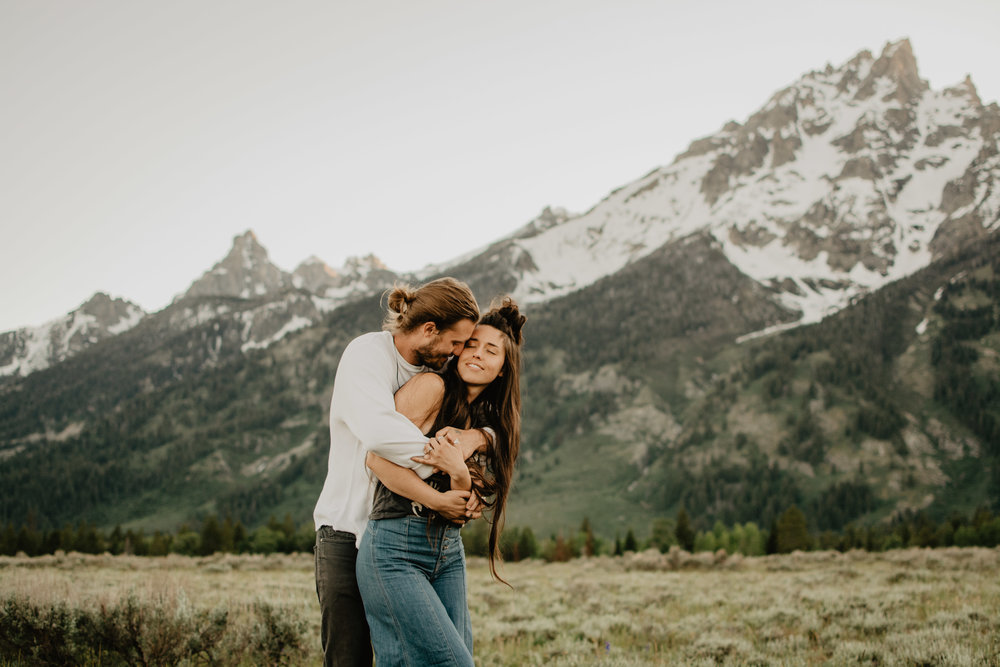 Snuggling for an engagement photo in the Grand Teton National Park.jpg