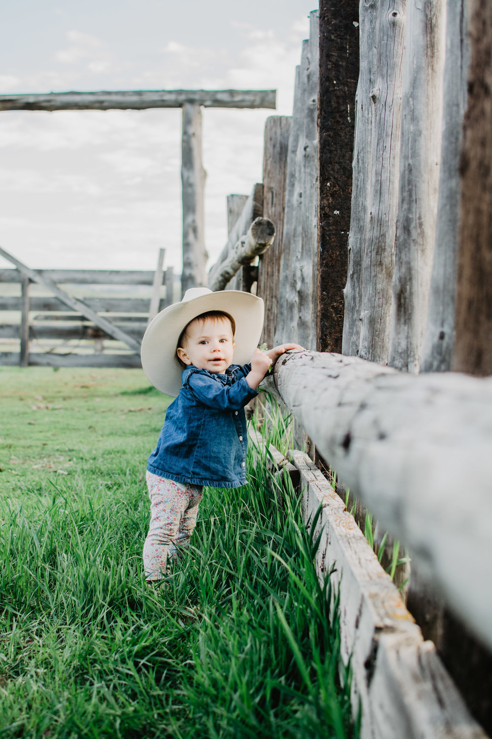 Jocilyn Bennett Photography. National Park Elopement Photography. Capturing raw and genuine emotion. Utah, Idaho, Wyoming, California, Washington, Colorado Photographer. Little girl wearing cowboy hat photograph.