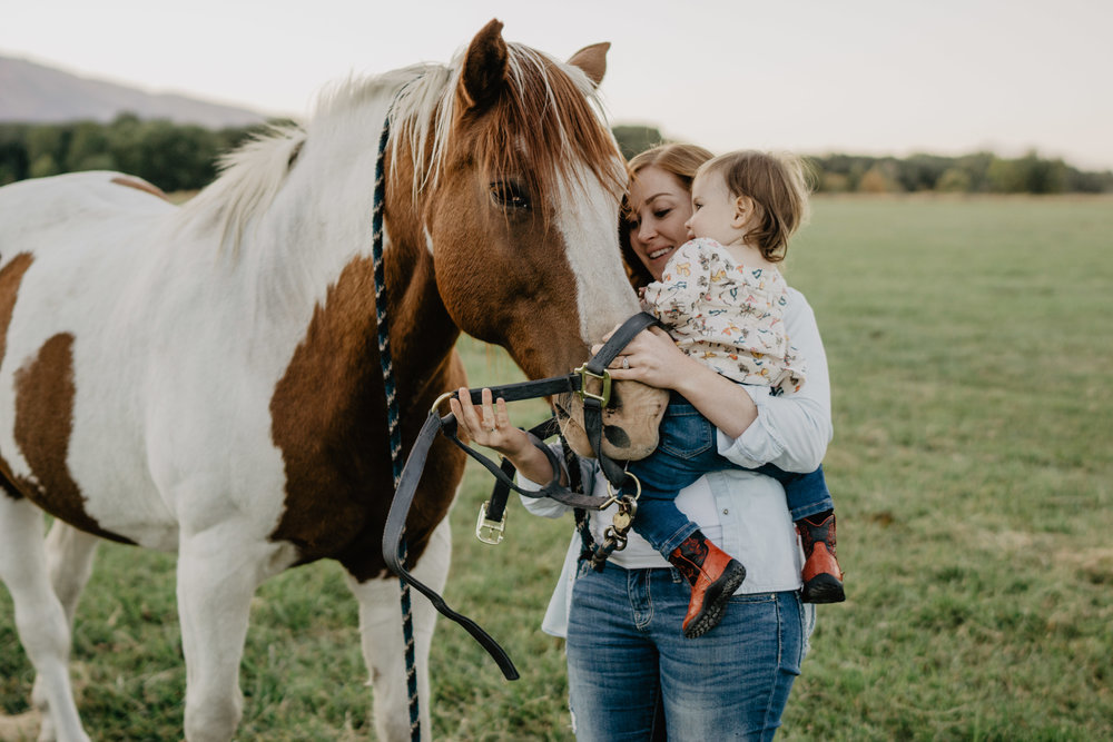 family photos with mother and child with their horse in Jackson Hole 