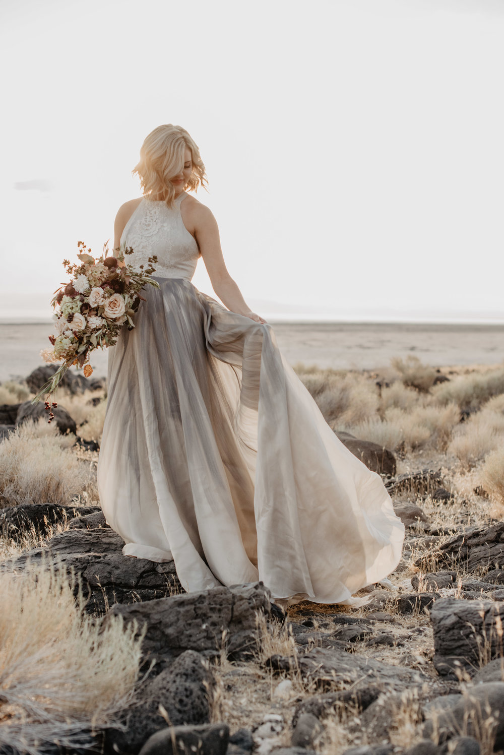 Jocilyn Bennett Photography | Destination Wedding Photographer | Elopement Wedding Photographer | National Park Elopement Photography | Capturing raw and genuine emotion | Utah Photographer | Utah wedding Photographer | National Park Weddings | Adventure Photographer | Bohemian photography | Bohemian wedding | Spiral Jetty photography | Bridals at the Spiral Jetty | Hand painted wedding gown