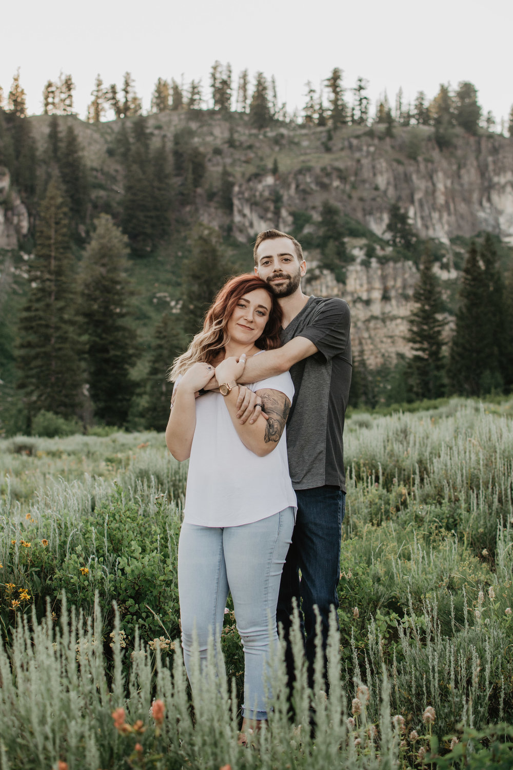 Jocilyn Bennett Photography | Engagement Pose Ideas | Destination Wedding Photographer | Elopement Wedding Photographer | National Park Elopement Photography | Capturing raw and genuine emotion | Utah Photographer | Utah wedding Photographer | National Park Weddings | Outfit ideas for engagements | Engagements with wild flowers| Adventure Photographer | What to wear guide for engagement | Mountain engagements | Location ideas for engagements | Logan Canyon, Utah | Tony Grove Lake |