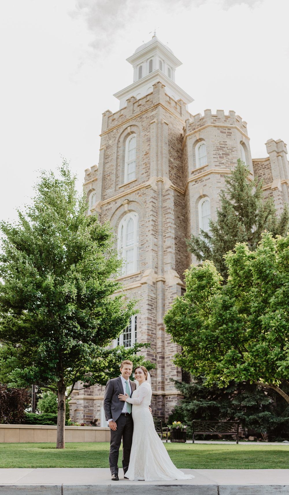 Jocilyn Bennett Photography | Utah Bride | LDS Bride | Utah Wedding Photography | When Two Become One | LDS civil wedding ceremony | Blending religions in families | Capturing Raw and Genuine Emotion | Combining Traditions | LDS Logan Temple | Temple Sealing | Bride and Groom in front of the temple |