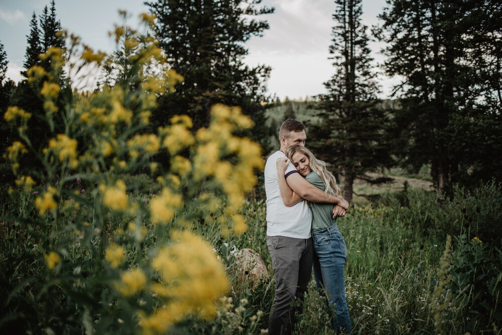 Jocilyn Bennett Photography | Mountain Engagements | Summer Engagements| Mountain Summer Engagements | Utah Engagements | Adventure Photographer | Wedding Photographer | Utah Photographer | Engagement Photographer | Wild Flower Engagements | Utah Bride | What to Wear For Engagements | Engagement Pose Ideas | Blonde Bride | Fur Baby | Fur Baby In Engagements | Fur Baby In Family Pictures |