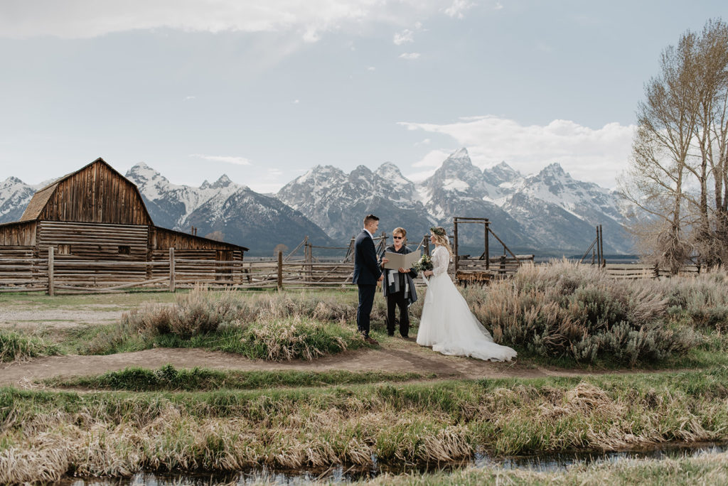 Jackson Hole photographer captures wedding ceremony in the Grand Tetons at Mormon Row for a fall wedding