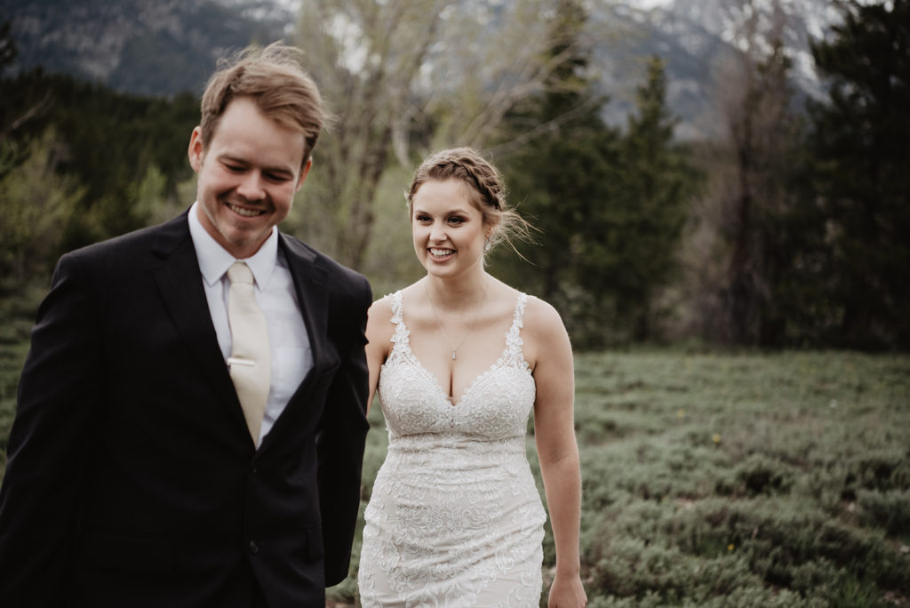 bride and grooms first look together outside of Spring Creek Ranch hotel 