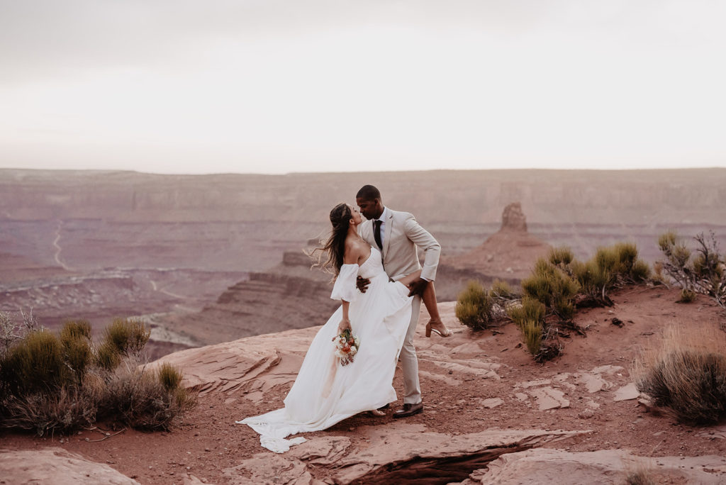 Utah Elopement Photographer captures romantic wedding images of bride and groom at Arches National Park wedding
