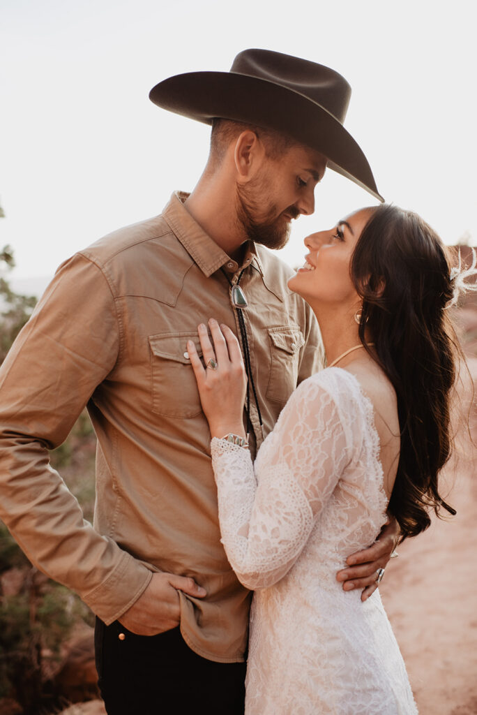 Utah Elopement Photographer captures bride looking up at groom