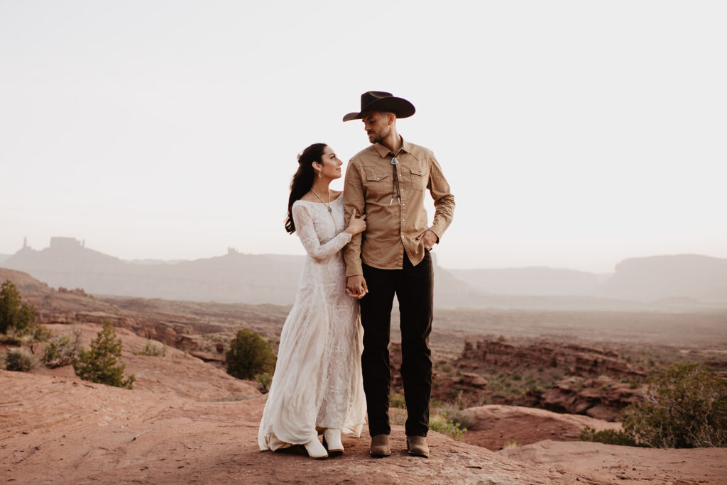 Utah elopement photographer captures bride and groom during bridal portraits in Arches National Park