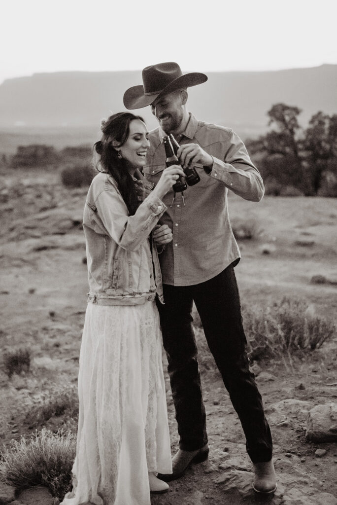 Utah elopement photographer captures black and white portrait of couple celebrating recent Moab elopement