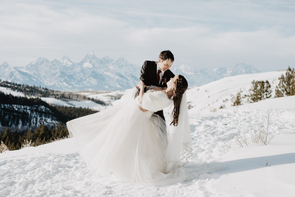 Grand Teton photographer captures groom dip kissing bride
