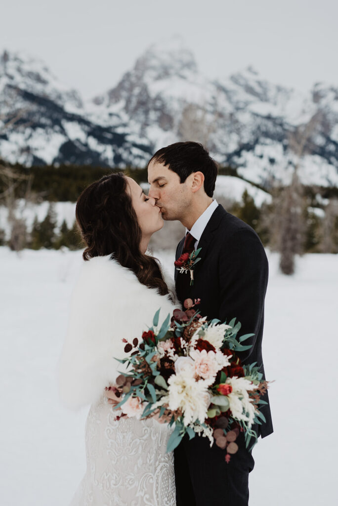 Grand Teton wedding photographer captures couple kissing in Grand Tetons