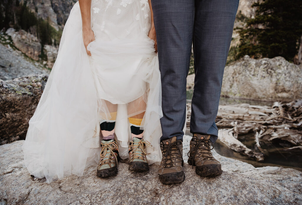 Jackson Hole photographer captures bride and groom wearing hiking boots 