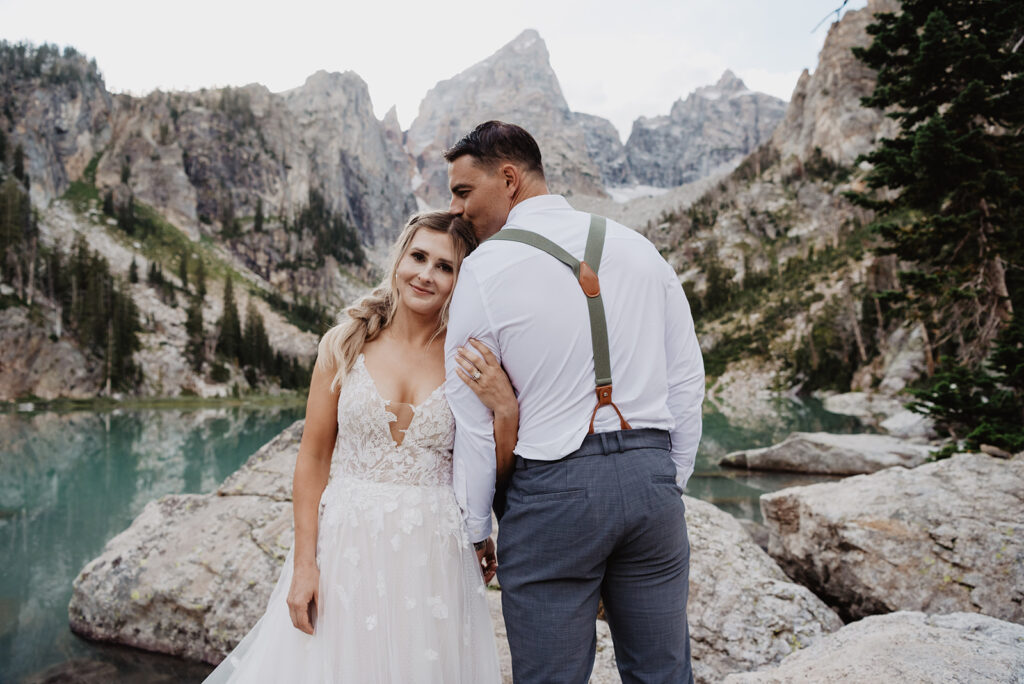 Jackson Hole photographer captures bride and groom hugging during bridal portraits in Jackson Hole elopement