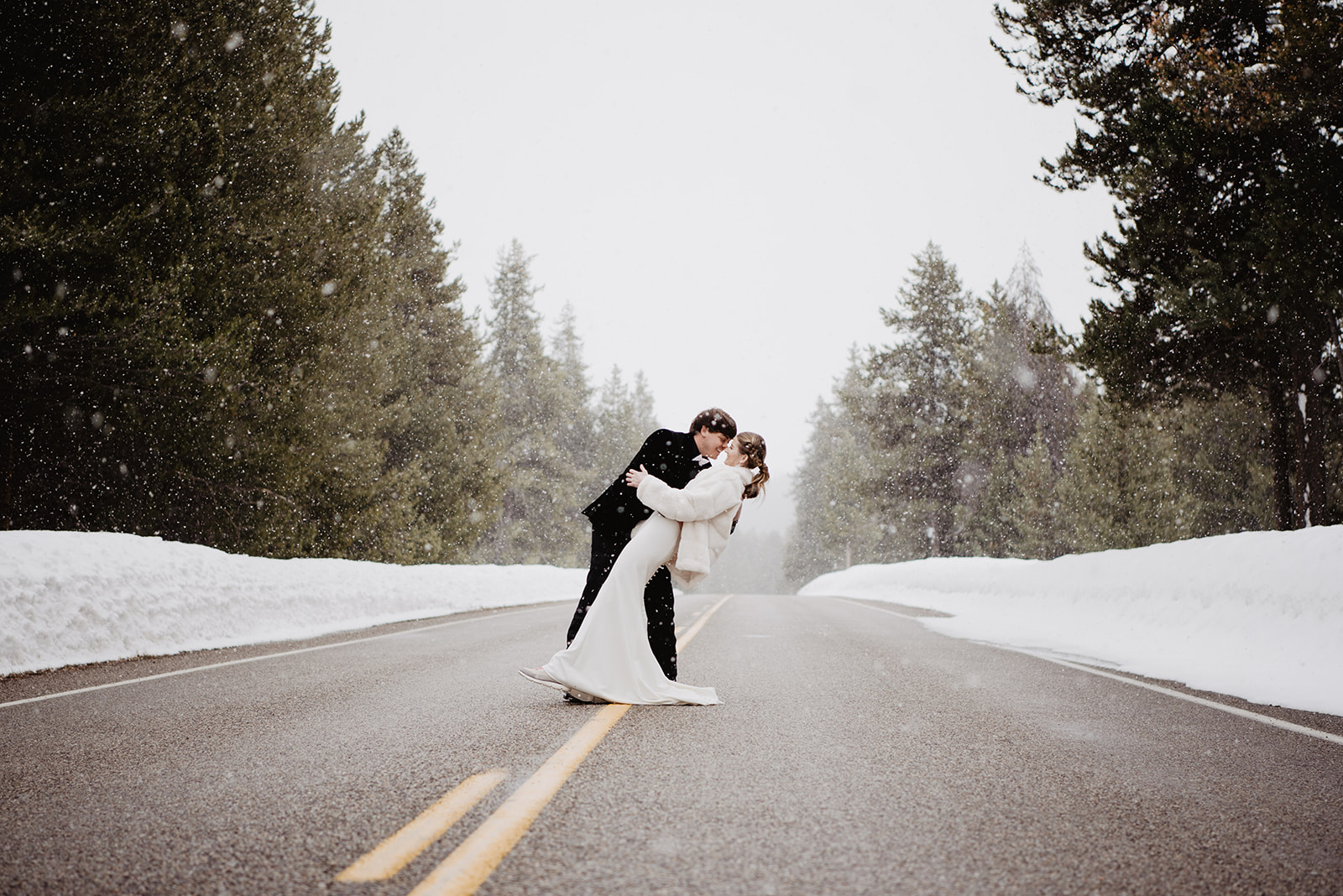Grand Teton photographer captures couple kissing in street while snowing