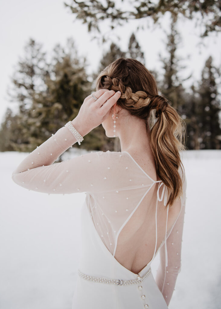 Grand Teton photographer captures close up of bridal hairstyle after winter elopement ceremony