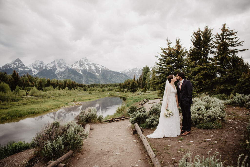 Jackson Hole wedding photographer captures couple kissing after Amangani Wedding Ceremony