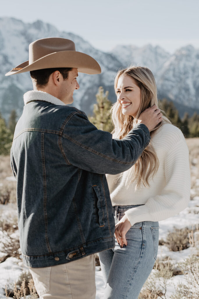 Jackson Hole wedding photographer captures man touching woman's face 