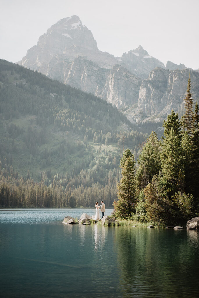 Jackson Hole elopement photographer captures bride and groom by lake