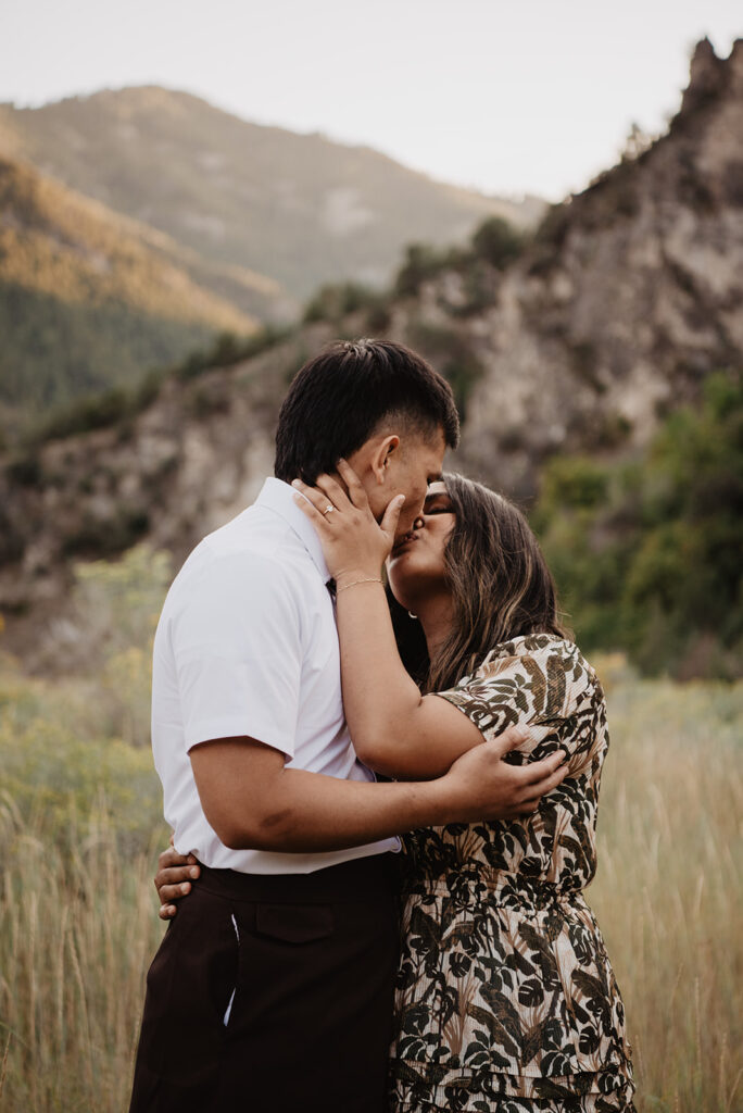 Utah elopement photographer captures man and woman kissing during Utah engagement photos