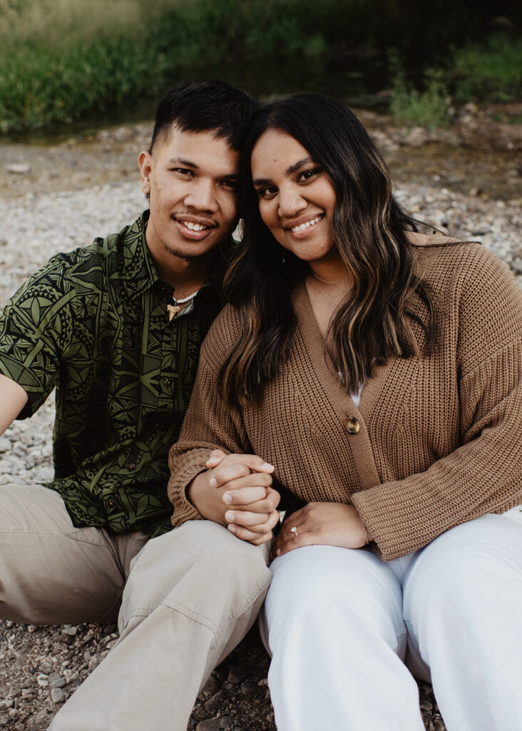 Utah elopement photographer captures couple sitting on gravel together