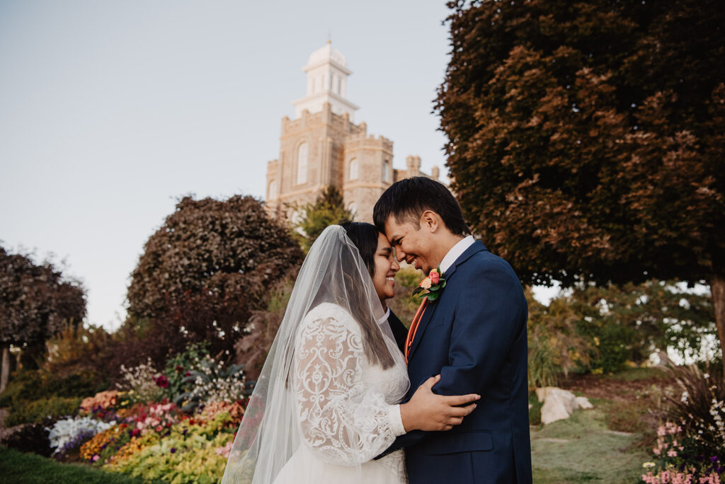 Utah elopement photographer captures bride and groom touching foreheads 