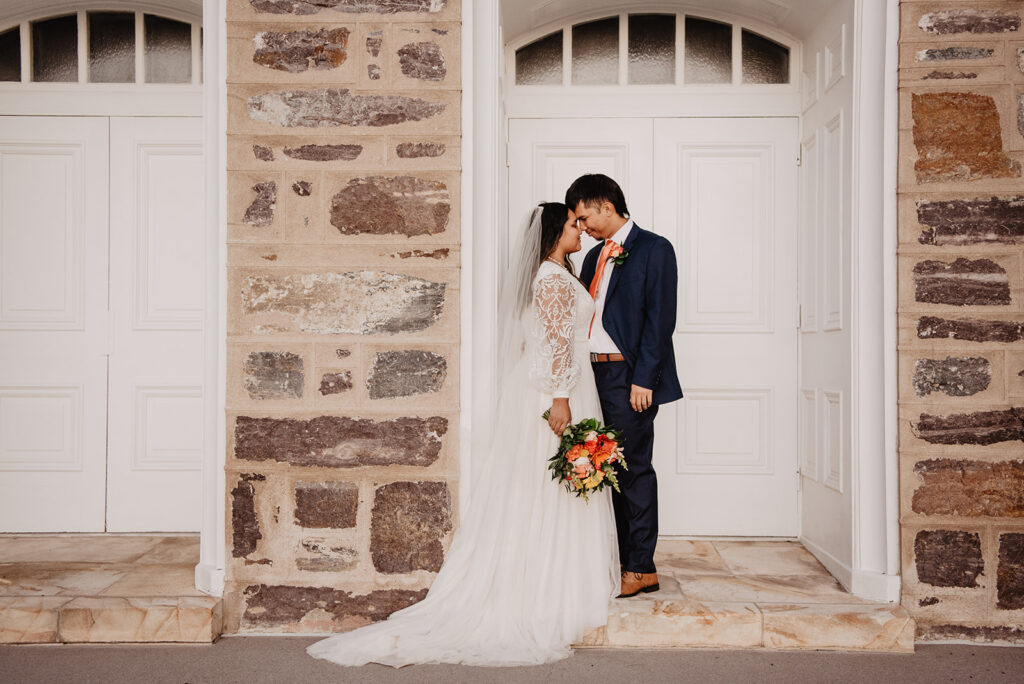 Utah Elopement Photographer captures bride and groom touching foreheads