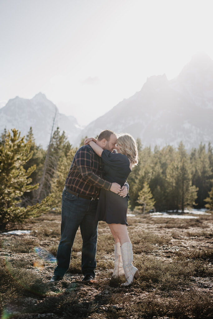 Jackson Wy photographer captures couple embracing and hugging during Jackson Hole honeymoon