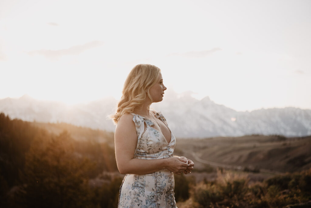 Jackson Wy photographer captures woman wearing light dress in Jackson Hole honeymoon in the Tetons