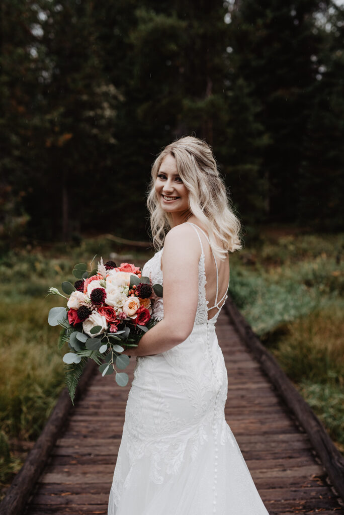 Jackson Hole Wedding Photographer captures bride holding bouquet