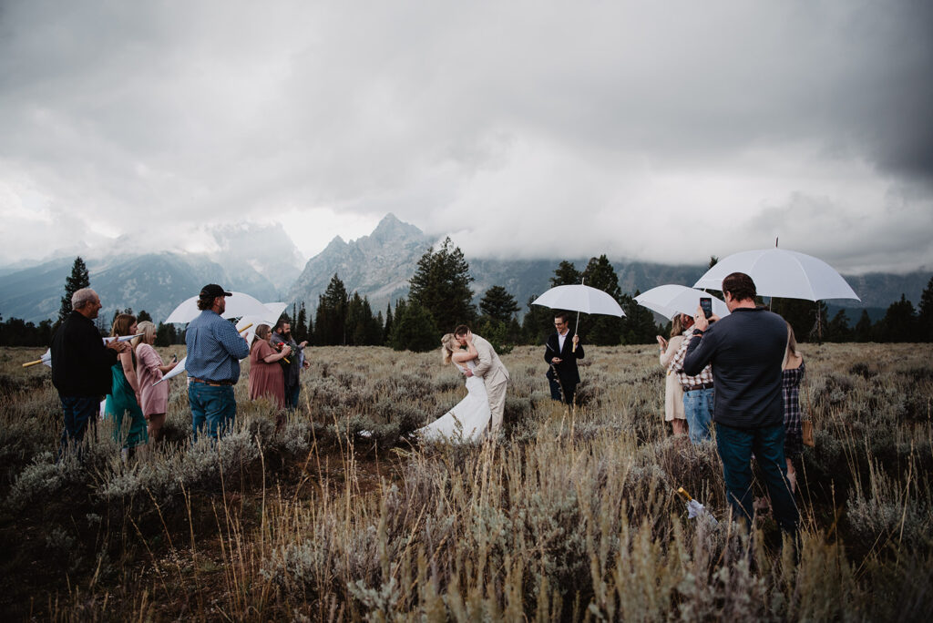Jackson Hole Wedding Photographer captures couple kissing during intimate elopement ceremony