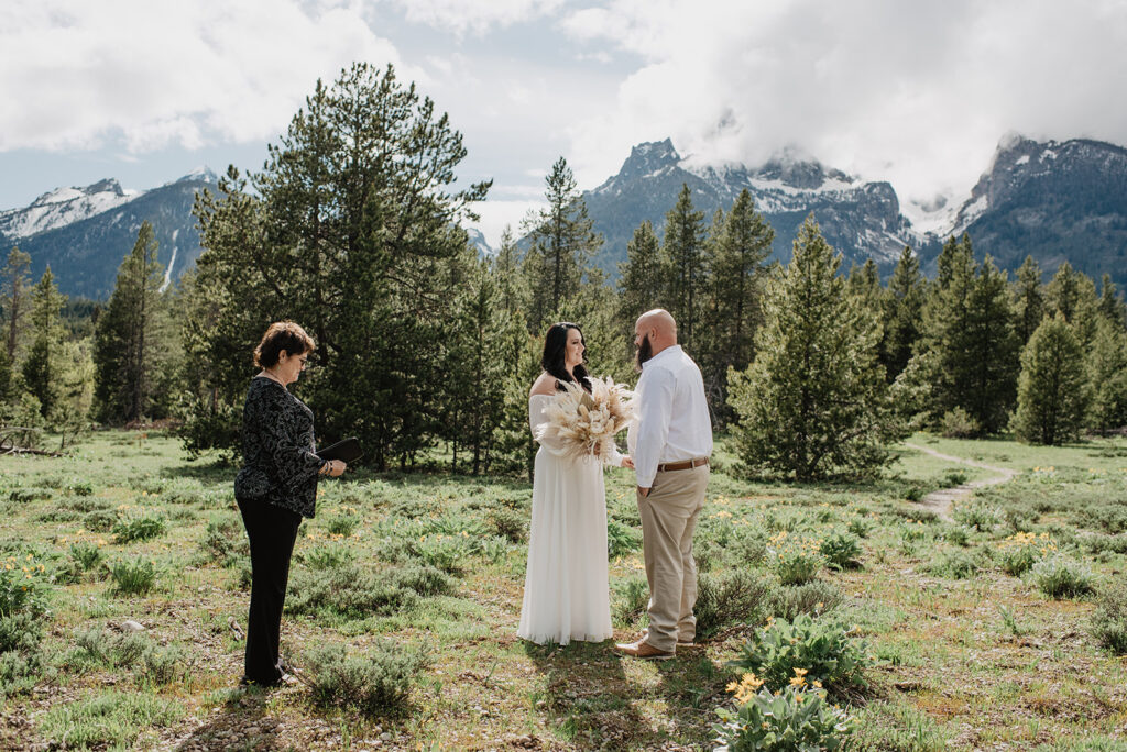 Wyoming Elopement Photographer captures couple celebrating recent marriage