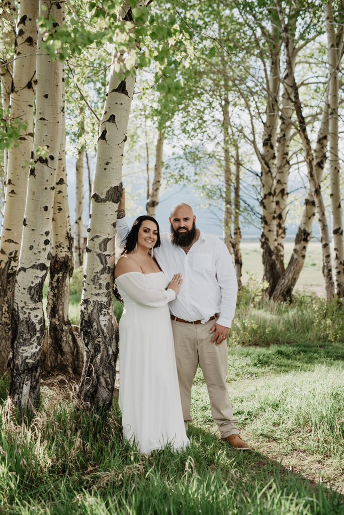 Wyoming Elopement Photographer captures bride and groom hugging during bridal portraits