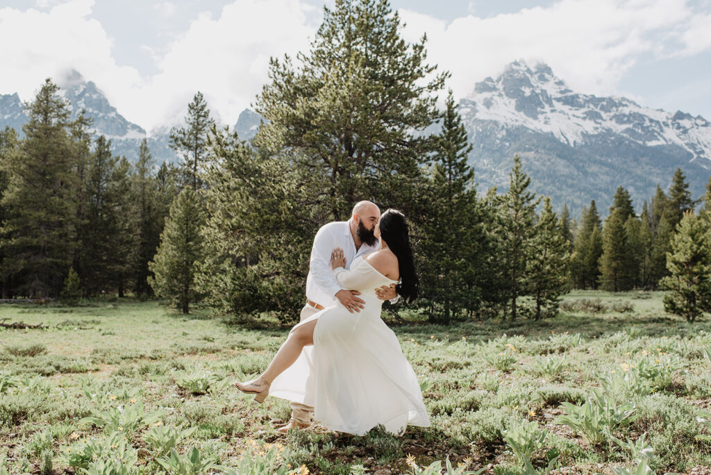 Wyoming Elopement Photographer captures bride and groom dip kiss