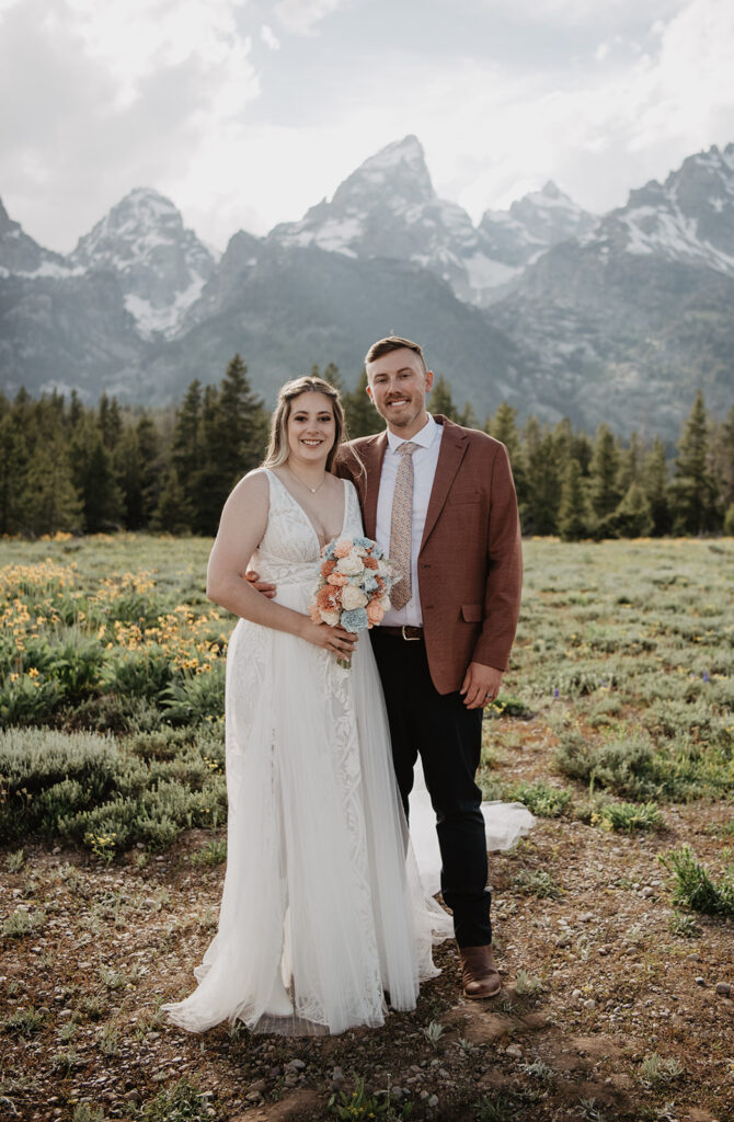 Grand Teton Wedding Photographer captures bride and groom embracing during bridal portraits