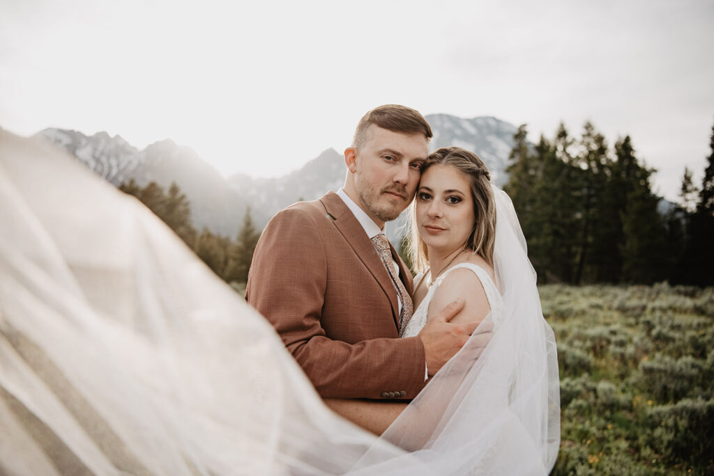 Grand Teton Wedding Photographer captures bride and groom touching foreheads