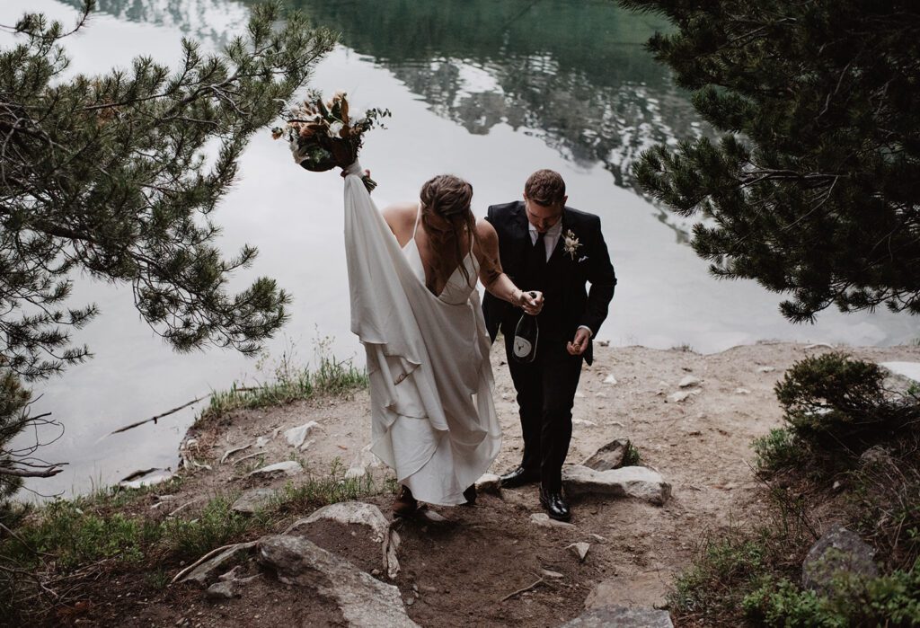 Jackson Hole Elopement Photographer captures bride and groom walking 