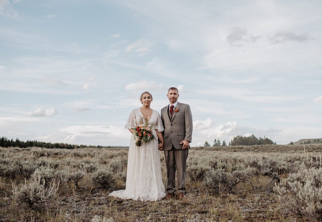 Jackson Hole Elopement Photographer captures bride and groom standing together after elopement