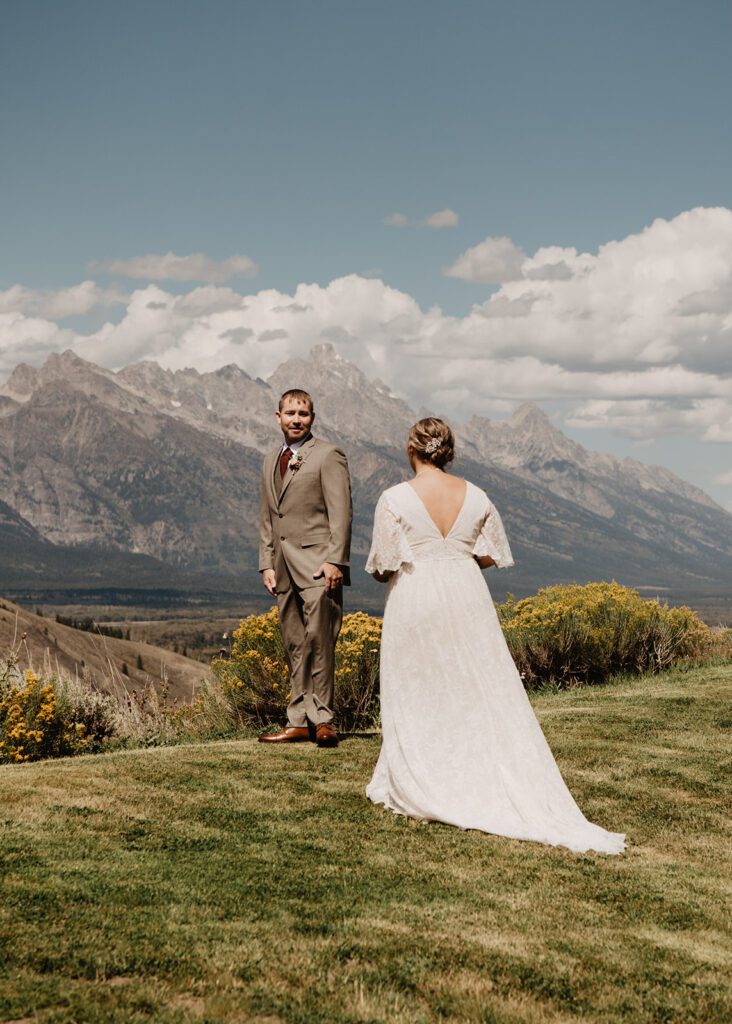 Jackson Hole Elopement Photographer captures groom seeing bride for first time on wedding day