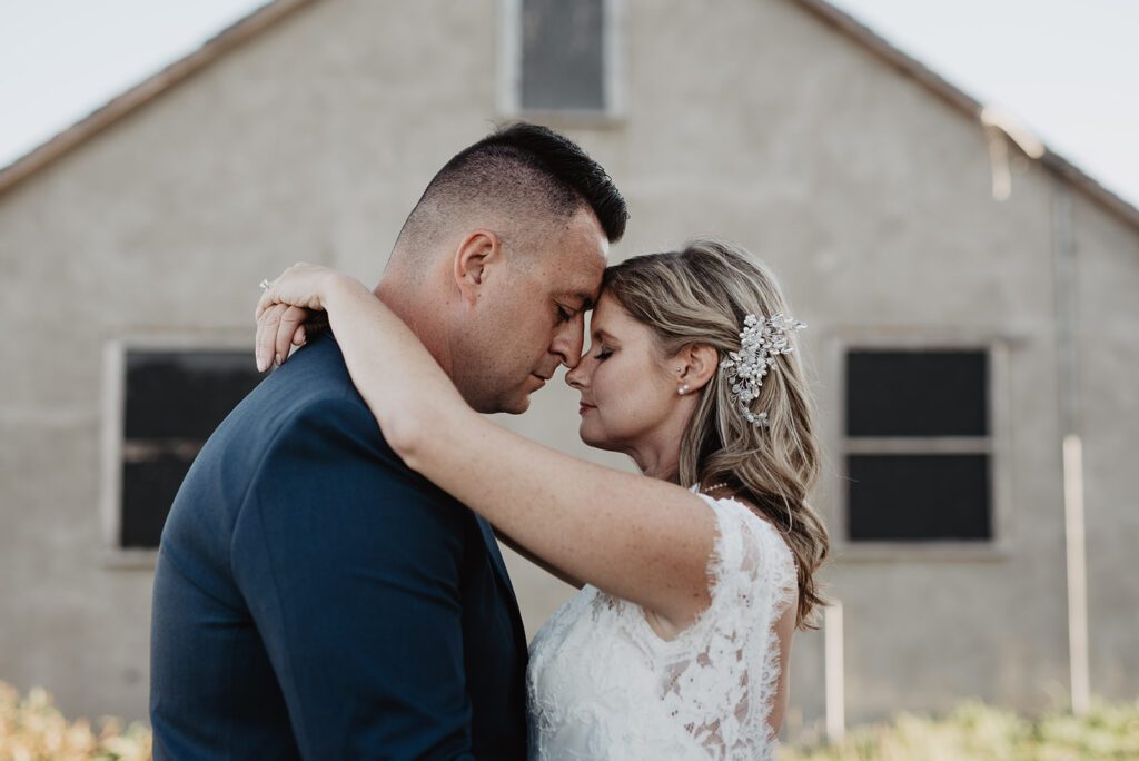 Jackson Hole Photographer captures bride and groom foreheads touching