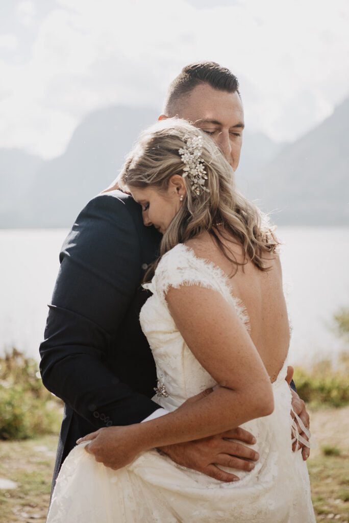 Jackson Hole Photographer captures bride and groom hugging